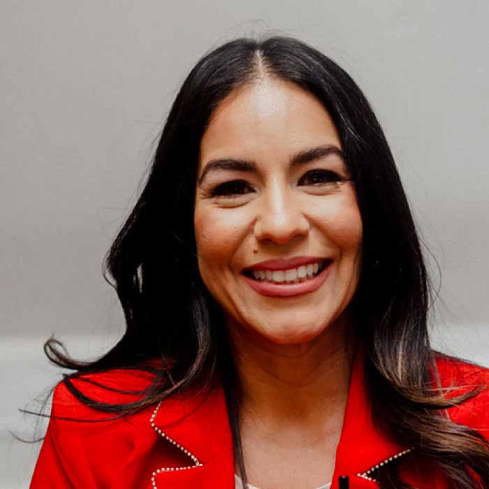 A female real estate agent at conference