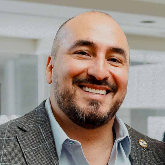 A male real estate agent at conference